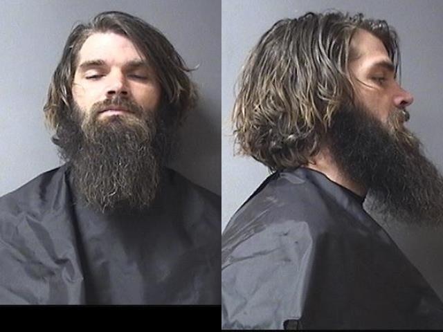 mugshot of Rigsbee, Brett Kelly