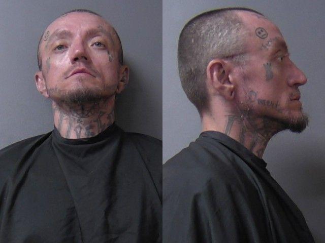 mugshot of Simmons, Joshua David