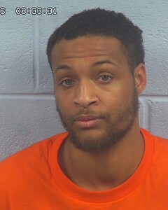 mugshot of DEQUNE  COWSER
