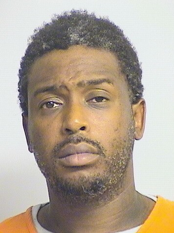 mugshot of Hughes