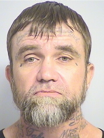 mugshot of Coupland