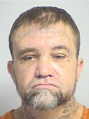 mugshot of Coupland