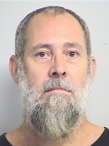 mugshot of Adams