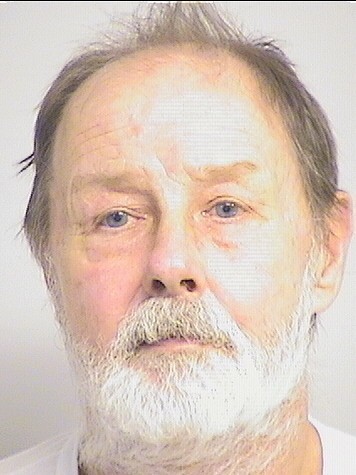 mugshot of Hughes