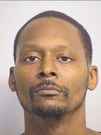 mugshot of Hughes