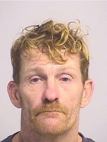 mugshot of Adams